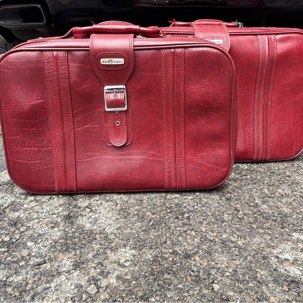 2  VINTAGE 1970’s World Travelers burgundy suitcases